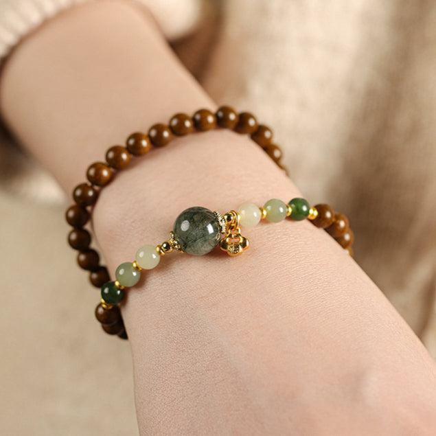 (Career and fortune) Ancient Chinese herbal medicine Hexiang incense beads green rutilated quartz crystal Hetian jade healing bracelet