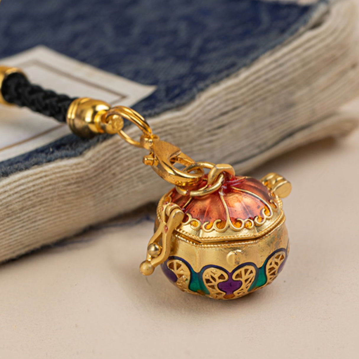 Pumpkin hollow sachet ball with incense pill mobile phone chain pendant