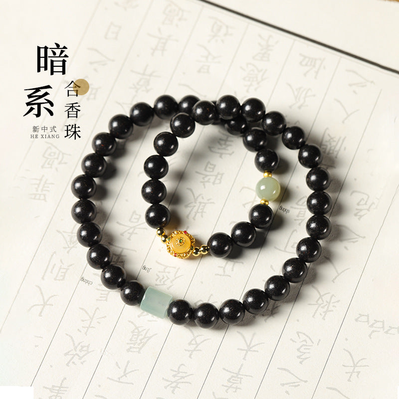 (Health and harmony) Hetian jade Beeswax Chinese Herbal HeXiang Bead Healing Bracelet