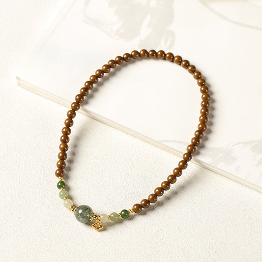 (Career and fortune) Ancient Chinese herbal medicine Hexiang incense beads green rutilated quartz crystal Hetian jade healing bracelet